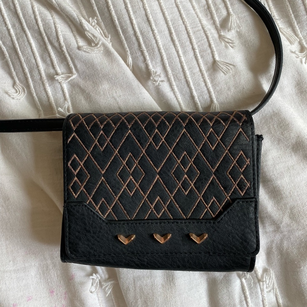 Sidekick purse, brand new, never used. Black bag with gold patterns.